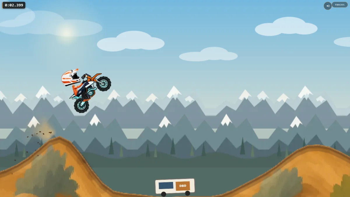The original 2D browser game: an orange bike and a rider in a white and orange helmet airborne over dirt hills, with snowy mountains and a DBD van behind